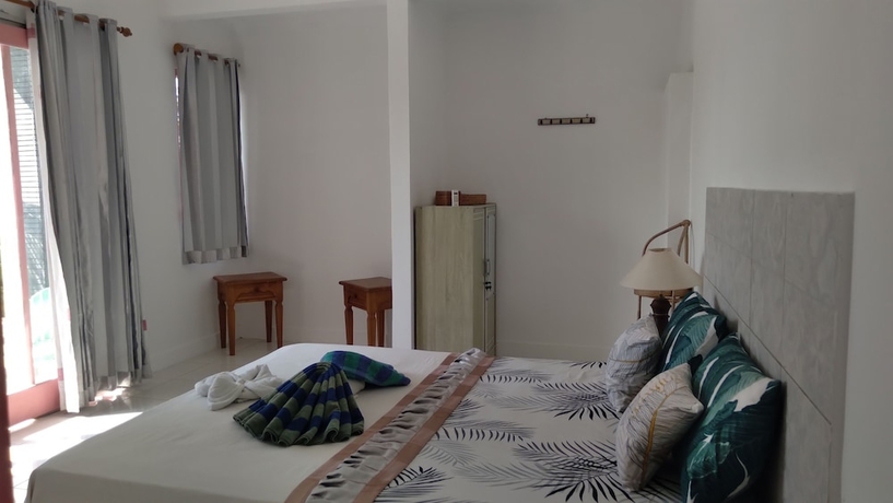 Imagen de la habitación del Hotel Palm Trees Villas. Foto 15