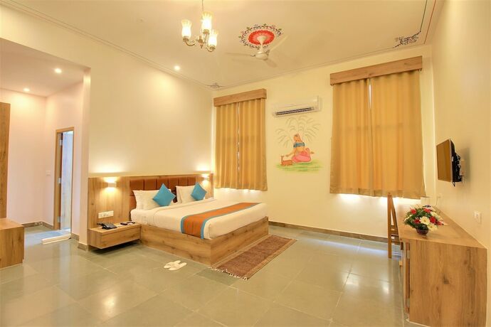 Imagen de la habitación del Hotel Palm Valley Svasti Resort. Foto 19