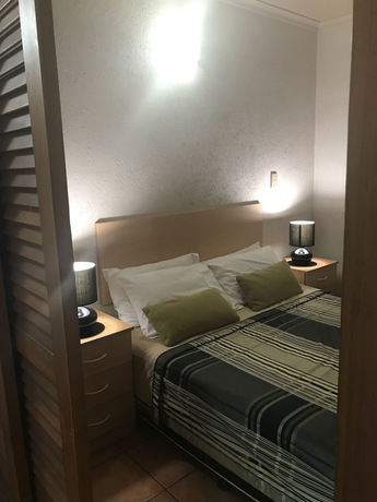 Imagen de la habitación del Hotel Palm Villas Resort. Foto 4