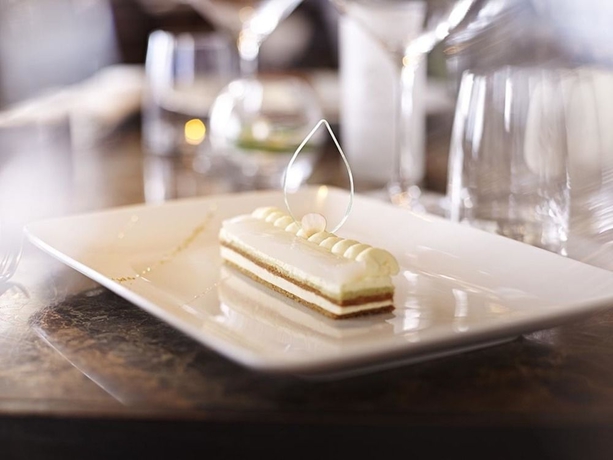 Imagen del bar/restaurante del Hotel Palm and Spa. Foto 7