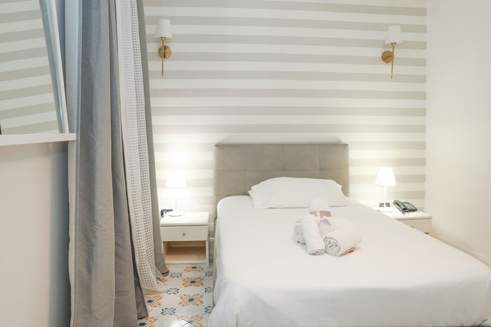 Imagen de la habitación del Hotel Palma, Castellammare di Stabia. Foto 8