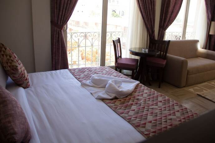 Imagen de la habitación del Hotel Palma Inn Resort. Foto 18