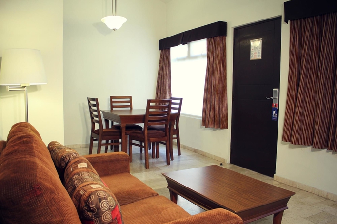 Imagen de la habitación del Hotel Palmareca Inn-suites-studios. Foto 5