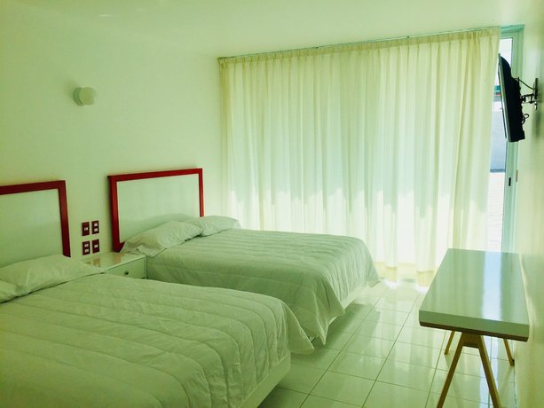 Imagen de la habitación del Hotel Palmas Cocoyoc. Foto 15