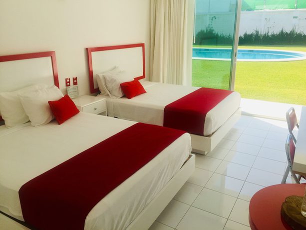 Imagen de la habitación del Hotel Palmas Cocoyoc. Foto 17