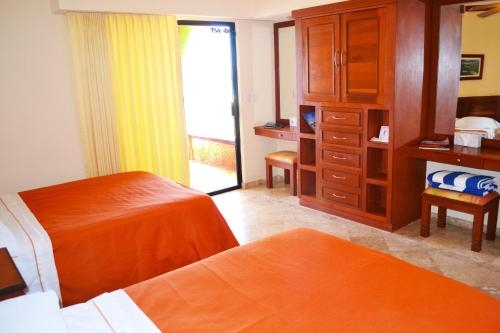 Imagen de la habitación del Hotel Palmas De Cortez. Foto 7