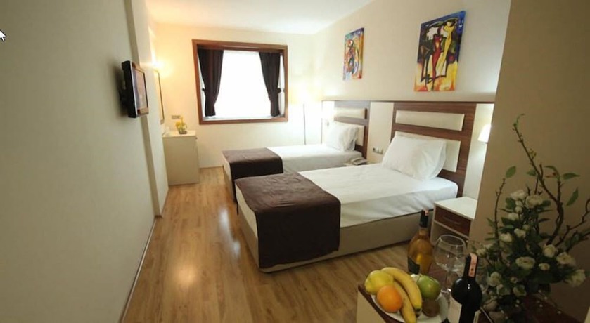 Imagen de la habitación del Hotel Palmcity Turgutlu. Foto 3