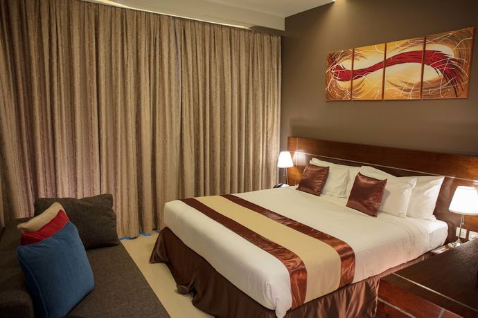 Imagen de la habitación del Hotel Palmeiras Suite. Foto 3