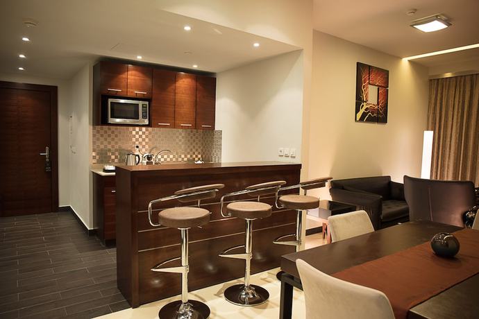 Imagen de la habitación del Hotel Palmeiras Suite. Foto 5