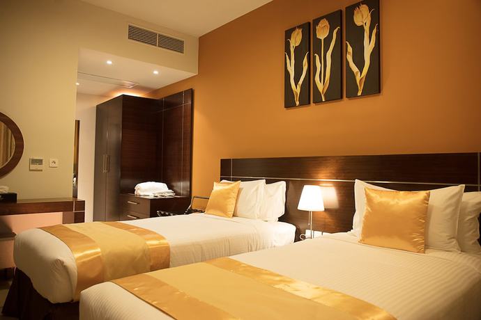 Imagen de la habitación del Hotel Palmeiras Suite. Foto 9