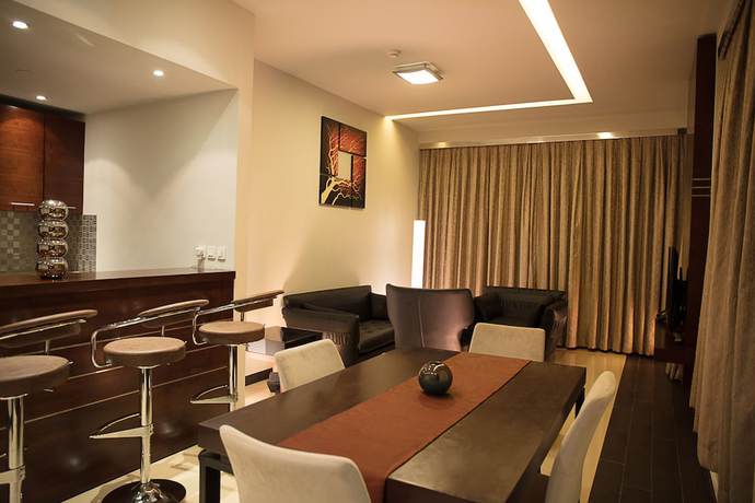 Imagen de la habitación del Hotel Palmeiras Suite. Foto 11