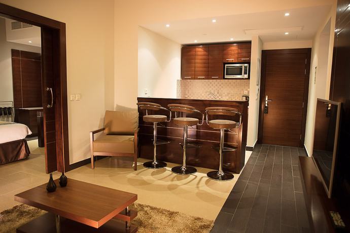 Imagen de la habitación del Hotel Palmeiras Suite. Foto 15