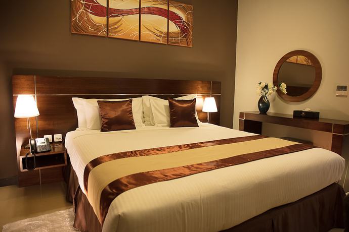 Imagen de la habitación del Hotel Palmeiras Suite. Foto 16