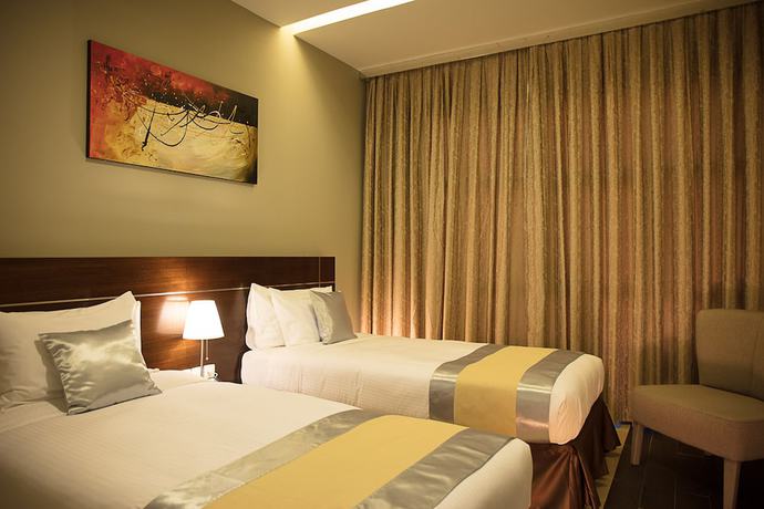 Imagen de la habitación del Hotel Palmeiras Suite. Foto 20