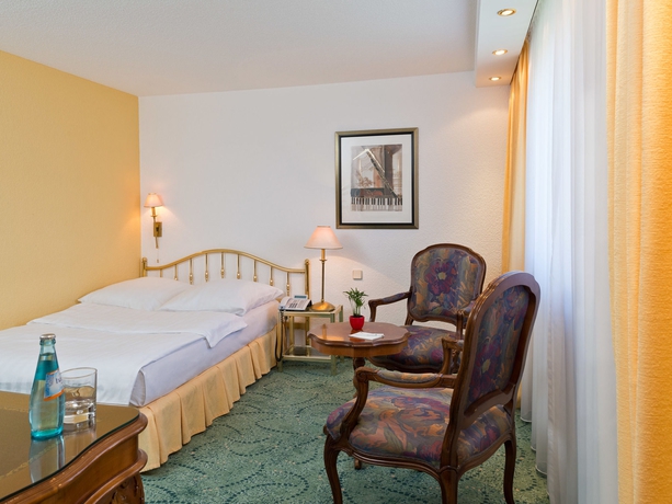 Imagen de la habitación del Hotel Palmenhof. Foto 7