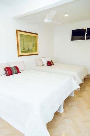 Imagen de la habitación del Hotel Palmera Beach Cartagena. Foto 17