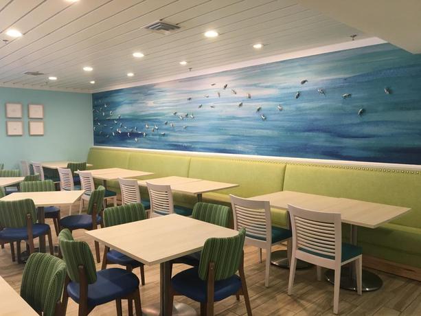 Imagen del bar/restaurante del Hotel Palmera Inn and Suites. Foto 7