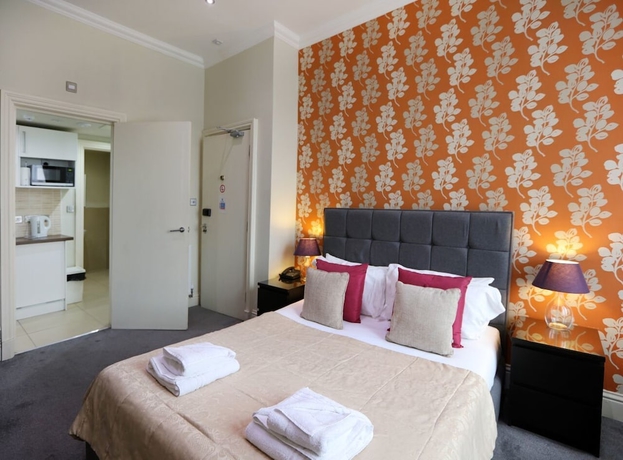 Imagen de la habitación del Hotel Palmerston Suites. Foto 3