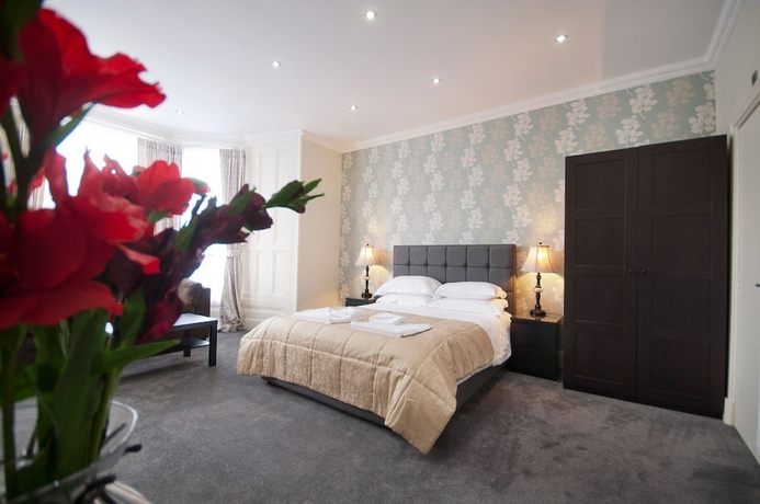 Imagen de la habitación del Hotel Palmerston Suites. Foto 4