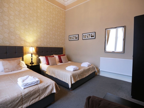 Imagen de la habitación del Hotel Palmerston Suites. Foto 8