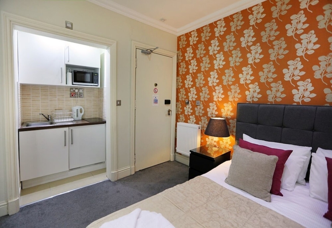 Imagen de la habitación del Hotel Palmerston Suites. Foto 13