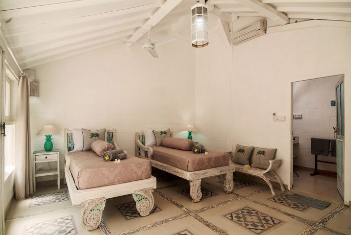 Imagen de la habitación del Hotel Palmeto Village. Foto 13