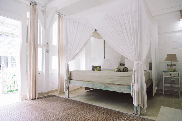 Imagen de la habitación del Hotel Palmeto Village. Foto 14