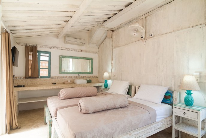 Imagen de la habitación del Hotel Palmeto Village. Foto 16