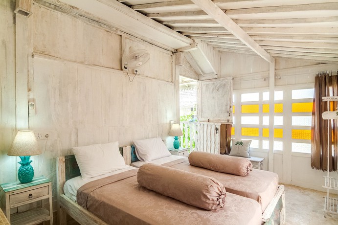 Imagen de la habitación del Hotel Palmeto Village. Foto 17