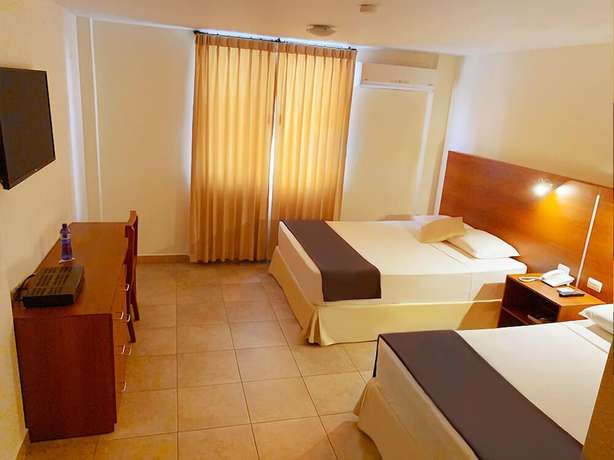 Imagen de la habitación del Hotel Palmira Inn. Foto 6