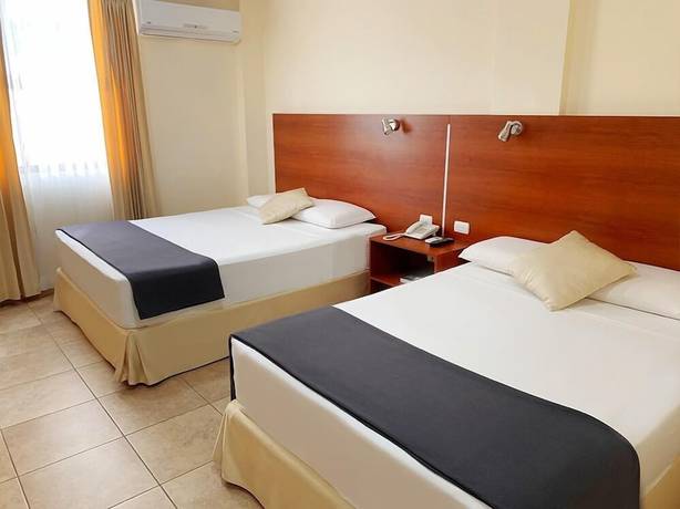 Imagen de la habitación del Hotel Palmira Inn. Foto 8
