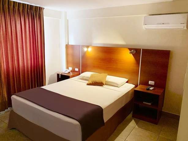 Imagen de la habitación del Hotel Palmira Inn. Foto 9