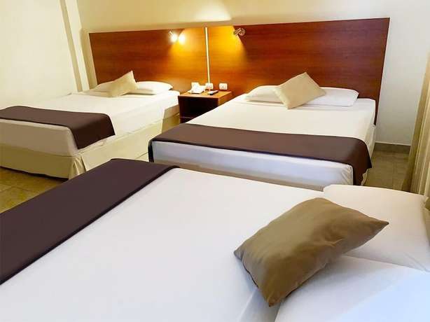 Imagen de la habitación del Hotel Palmira Inn. Foto 13
