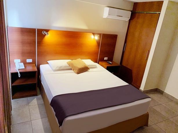 Imagen de la habitación del Hotel Palmira Inn. Foto 14