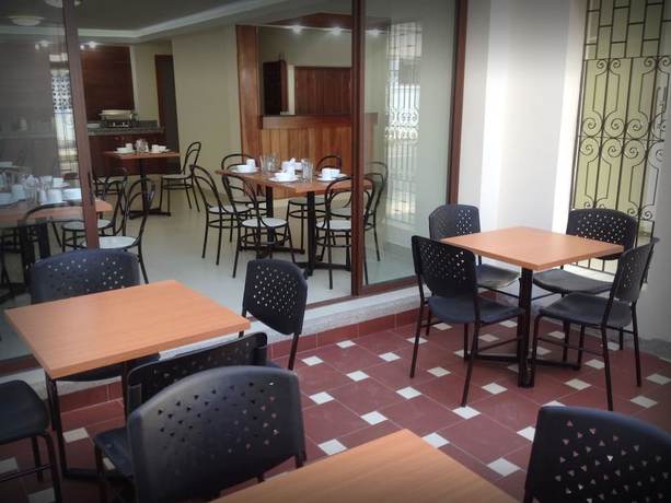 Imagen del bar/restaurante del Hotel Palmira Inn. Foto 4