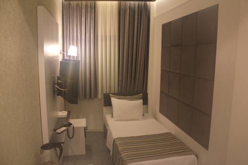 Imagen de la habitación del Hotel Palmiye Hotel Taksim. Foto 3