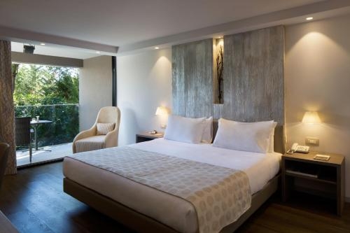 Imagen de la habitación del Hotel Palmon Bay and Spa. Foto 10