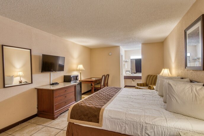 Imagen de la habitación del Hotel Palms Garden Inn. Foto 17