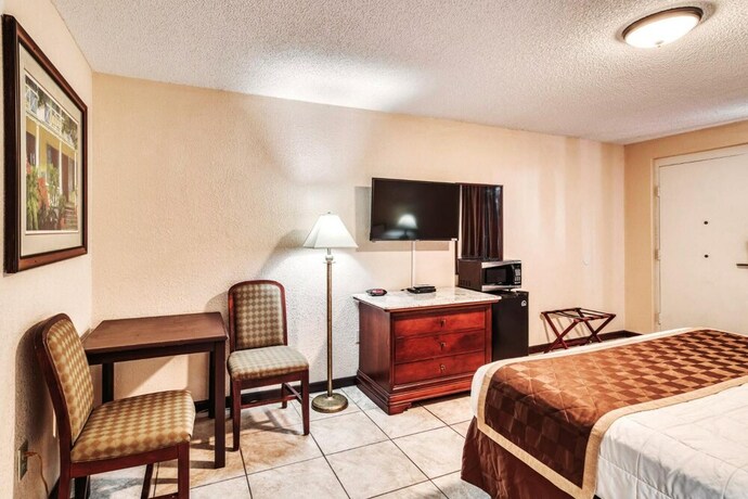 Imagen de la habitación del Hotel Palms Garden Inn. Foto 19