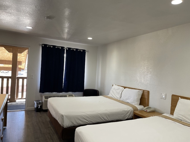 Imagen de la habitación del Hotel Palms Inn and Suites. Foto 8