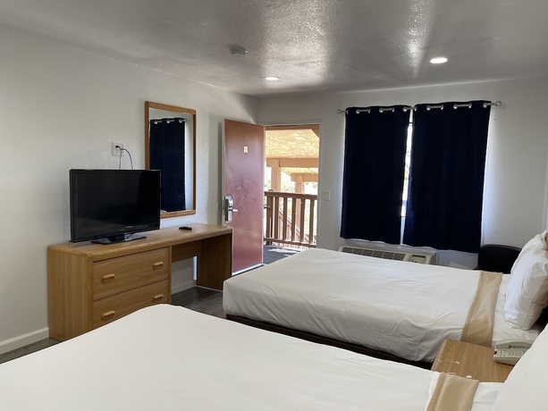 Imagen de la habitación del Hotel Palms Inn and Suites. Foto 9