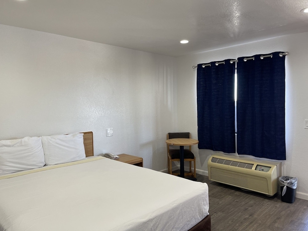 Imagen de la habitación del Hotel Palms Inn and Suites. Foto 10