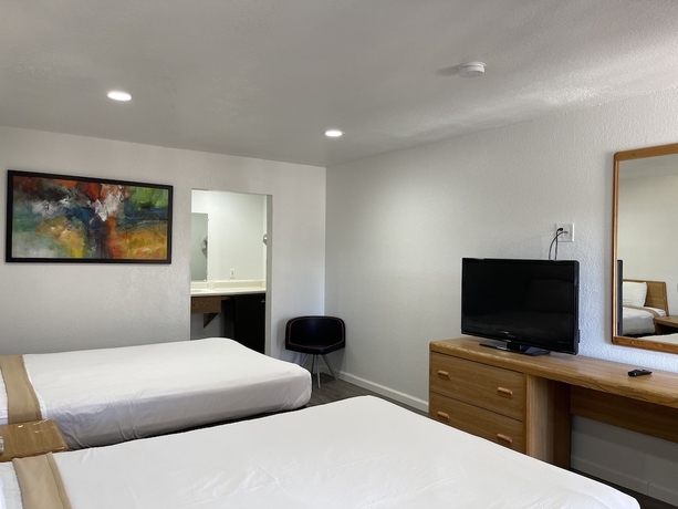 Imagen de la habitación del Hotel Palms Inn and Suites. Foto 13