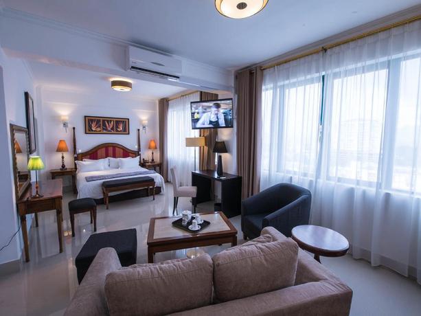 Imagen de la habitación del Hotel Palms, Quatre Bornes. Foto 5