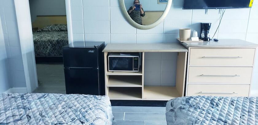 Imagen de la habitación del Hotel Palms by the Beach Motel. Foto 9