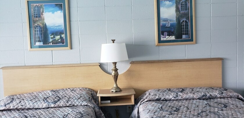 Imagen de la habitación del Hotel Palms by the Beach Motel. Foto 12