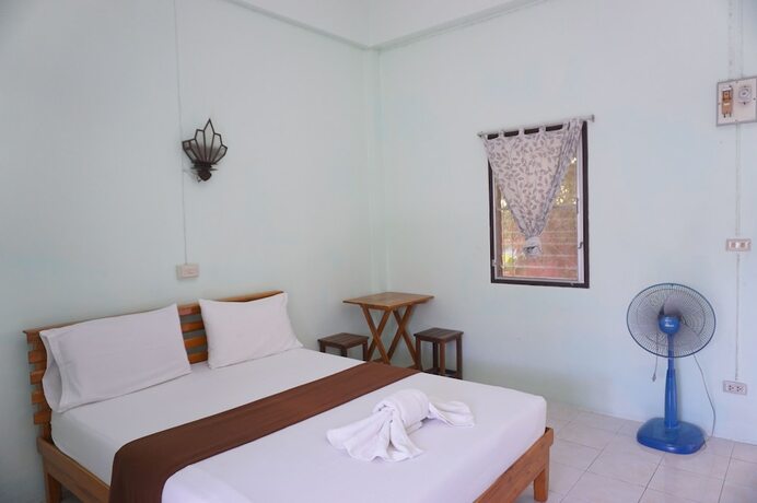 Imagen de la habitación del Hotel Palmy Home. Foto 19