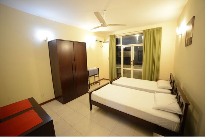 Imagen de la habitación del Hotel Palmyrah Residencies. Foto 2