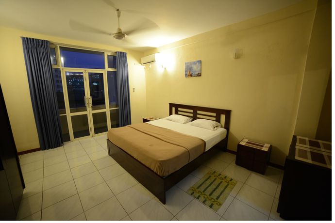 Imagen de la habitación del Hotel Palmyrah Residencies. Foto 8