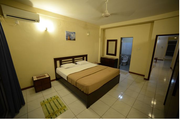 Imagen de la habitación del Hotel Palmyrah Residencies. Foto 9